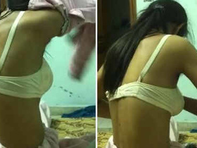 Desi Indian girl gets seduced by a client in this steamy video