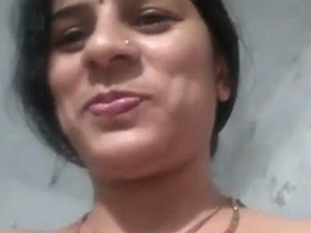 Indian auntie indulges in solo masturbation and nude selfies
