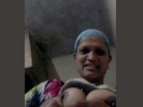 Mature Indian bhabhi strips and teases on video call