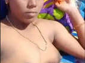 Tamil bhabhi flaunts her big boobs and pussy