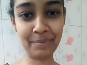 Nude Indian girl takes solo nude selfies without bra