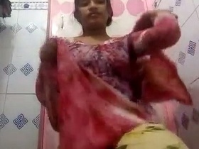 Indian girl strips naked in the bathroom for a solo video