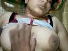 Indian wife seduces her husband with her big tits in bed