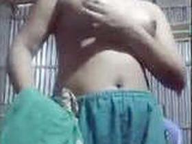 A girl from a slum strips naked for her lover