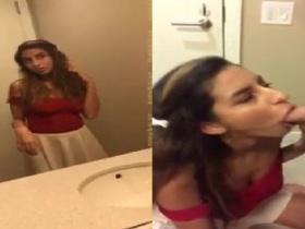 Indian girl Desi gives a blowjob in the bathroom