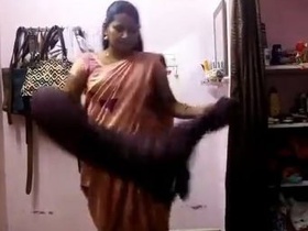 Village girl undresses in front of camera