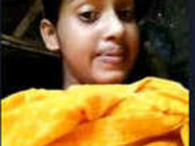 Cute Indian girl reveals her breasts and vagina