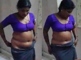 Navel-focused video featuring a woman with a big belly button