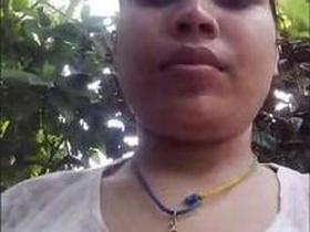 Indian girl flaunts her breasts and pussy in a steamy video