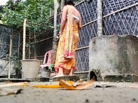 Desi's naked bath in the middle of a village