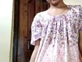 A beautiful woman displays her breasts and genitals