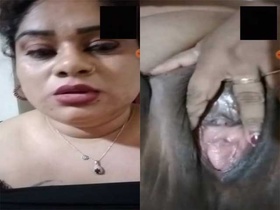 Voluptuous Indian woman flaunts her ample cleavage and large vagina