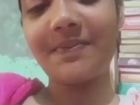 Cute girl shows off her big boobs in steamy video