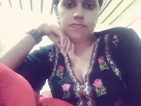 Bhabhi strips down to her lingerie and records a video for her lover