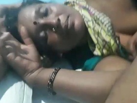 Mature woman enjoys intimate moments with her lover in a hotel