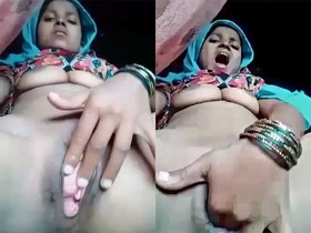 Busty babhi's solo masturbating session with a village audience