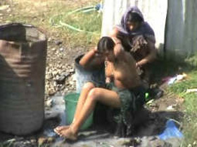 Outdoor shower with girls from Dhaba - An open-air experience