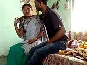 Mature Indian woman gets it on with her son's friend