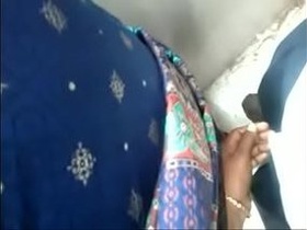 Desi aunty performs a public handjob in India