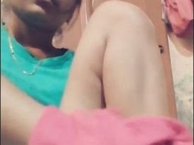 Cute desi teen opens her dress to show her perky tits and shaved pussy