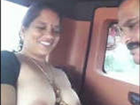 Busty Tamil bhabhi gives her lover a titjob