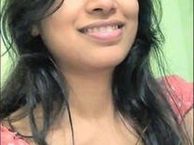 Nikitha, the Indian wife, shows off her curves in this steamy video