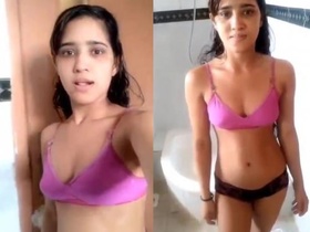 Beautiful girl takes a bath in front of the camera