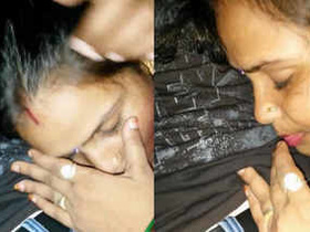 Indian wife and neighbor girl engage in smooching and blowjob