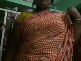 Indian mature woman with big tits and a curvy body