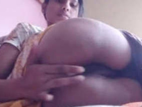 Desi cutie demonstrates her expertise in pussy fingering