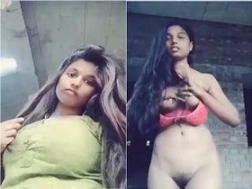 Exclusive video of a cute girl exposing her breasts and pussy