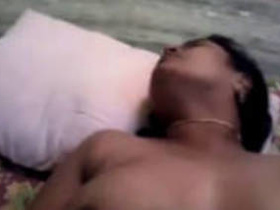 Tamil aunty pleasures herself with her fingers