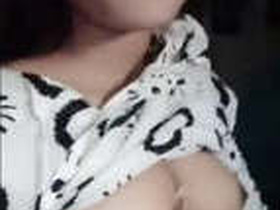 Sexy teen with a seductive gaze in a steamy video