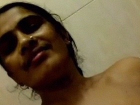 Mature Indian woman takes nude selfies in the bathroom