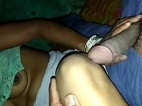 Indian bhabhi gives a sensual blowjob while pressing her breasts