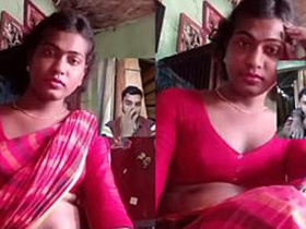 Experience the eroticism of a village aunty in saree, showing off her hot navel