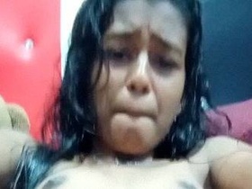 Solo masturbation with a nude Tamil beauty fingering her hairy pussy