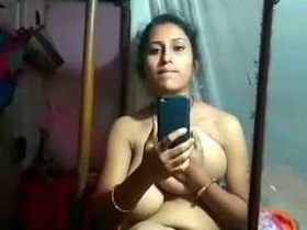 Desi babe with huge boobs strips down and plays with herself