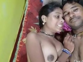 Indian desi girl exposes her breasts in bedroom for camera