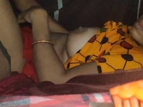 Mature Indian aunty enjoys steamy sex with her younger lover