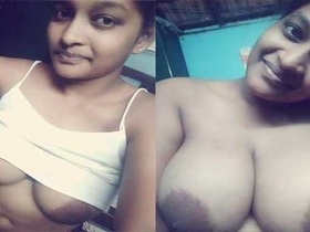 Tamil village girl flaunts her huge breasts in nude video