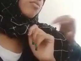 Hijabi-clad couple enjoys romantic moments together