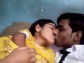 Desi lovers smooching and pressing their boobs together
