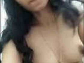 Adorable Tamil girl pleasures herself with her fingers