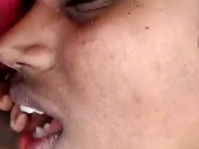 Three people have a threesome outdoors