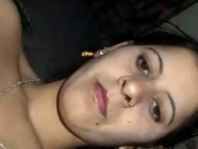 Desi aunty pleasures herself with fingering and licking in selfie video