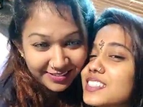 Hot Indian lesbians indulge in a passionate kissing session